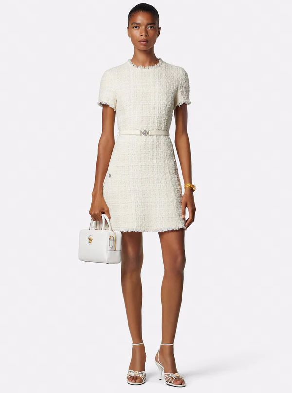 <a href="https://www.versace.com/us/en/women/clothing/dresses/tweed-cotton-mini-dress--white/1022618-1A16514_1W010.html">VERSACE Dress</a>, $1345