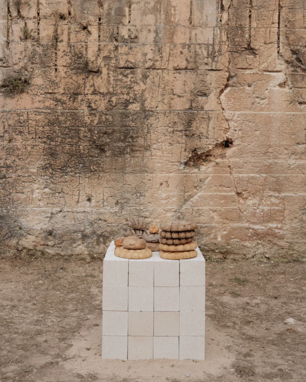 An Intimate Menorca Quarry Wedding with Avant-Garde Design & Vintage Bridal Looks