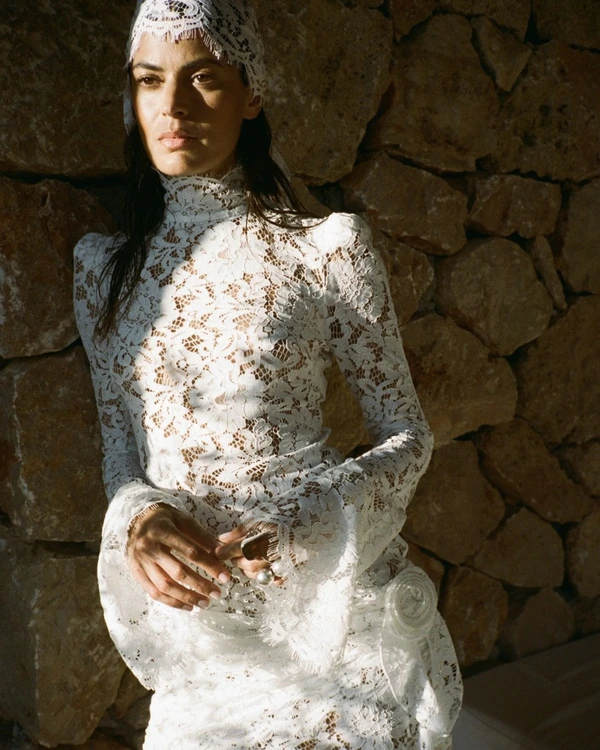 <a href="https://www.delavali.com/products/bodita-mini-dress-cotton-lace-white">DE LA VALI Mini Dress</a>, $685