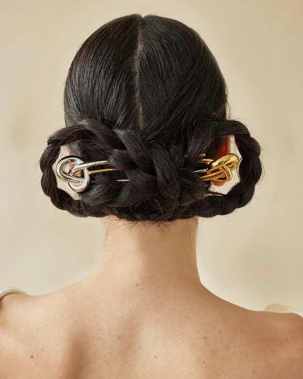 <a href="https://leletny.com/products/glossy-knot-french-pin-copy">LELET Glossy Knot French Pin</a>, $228