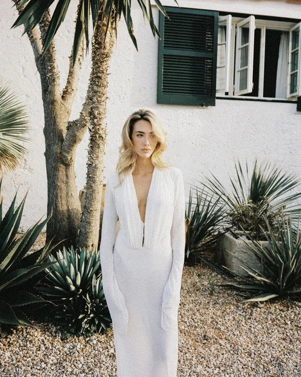 An Intimate Menorca Quarry Wedding with Avant-Garde Design & Vintage Bridal Looks