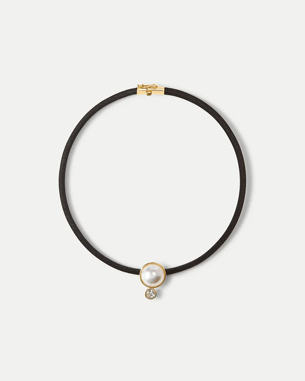 <a href="https://veronicabeard.com/products/pearl-pendant-cord-necklace-pearl-black">VERONICA BEARD Necklace</a>, $150