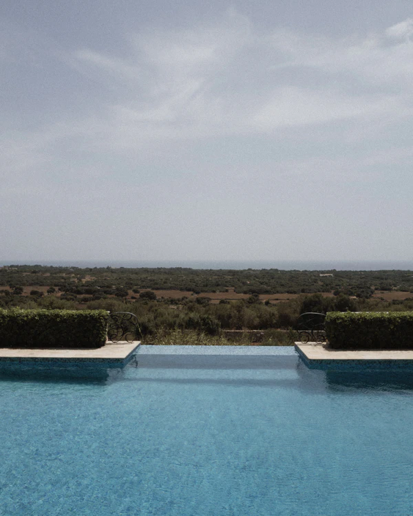 An Intimate Menorca Quarry Wedding with Avant-Garde Design & Vintage Bridal Looks