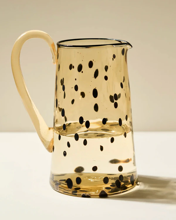 <a href="https://gather.glass/products/manhattan-dotted-jug-in-whisky">GATHER Manhattan Dotted Jug</a>, $383