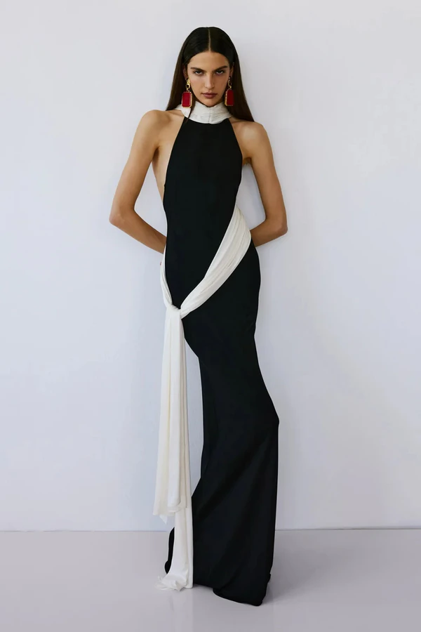 <a href="https://us.ilkyazozel.com/products/leia-train-dress-in-raven">ILKYAZ OZEL Dress</a>, $1095