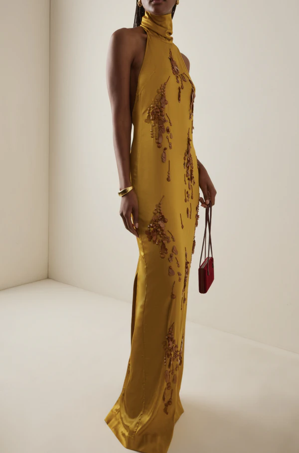 <a href="https://www.modaoperandi.com/women/p/des_phemmes/embellished-backless-gown/736086">DES PHEMMES Backless Embellished Satin Column Gown from Moda Operandi, $1,195</a>