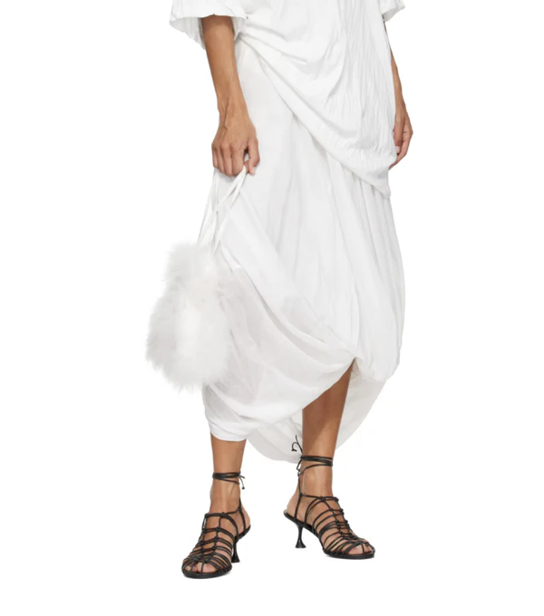 <a href="https://www.ssense.com/en-us/women/product/yves-salomon/off-white-feather-pouch/19791081?clickref=1110l4wJLNB8&amp;utm_source=PH_1011l2075&amp;utm_medium=affiliate&amp;utm_content=1100l24751&amp;utm_term=https%3A%2F%2Fwww.lyst.com%2F&amp;utm_campaign=">YVES SALOMON </a><span style="font-family: 'GT America', sans-serif;"><a href="https://www.ssense.com/en-us/women/product/yves-salomon/off-white-feather-pouch/19791081?clickref=1110l4wJLNB8&amp;utm_source=PH_1011l2075&amp;utm_medium=affiliate&amp;utm_content=1100l24751&amp;utm_term=https%3A%2F%2Fwww.lyst.com%2F&amp;utm_campaign=">Off-White Feather Pouch from Ssense</a>, $225</span>