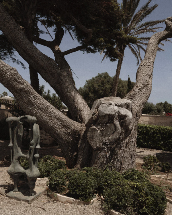 An Intimate Menorca Quarry Wedding with Avant-Garde Design & Vintage Bridal Looks