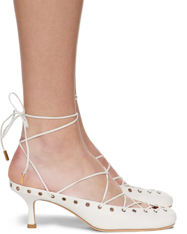 <a href="https://www.ssense.com/en-us/women/product/chloe/white-chloe-ghillies-mules/17722511">Chloé Ghillies Mules</a> from Ssense, $990