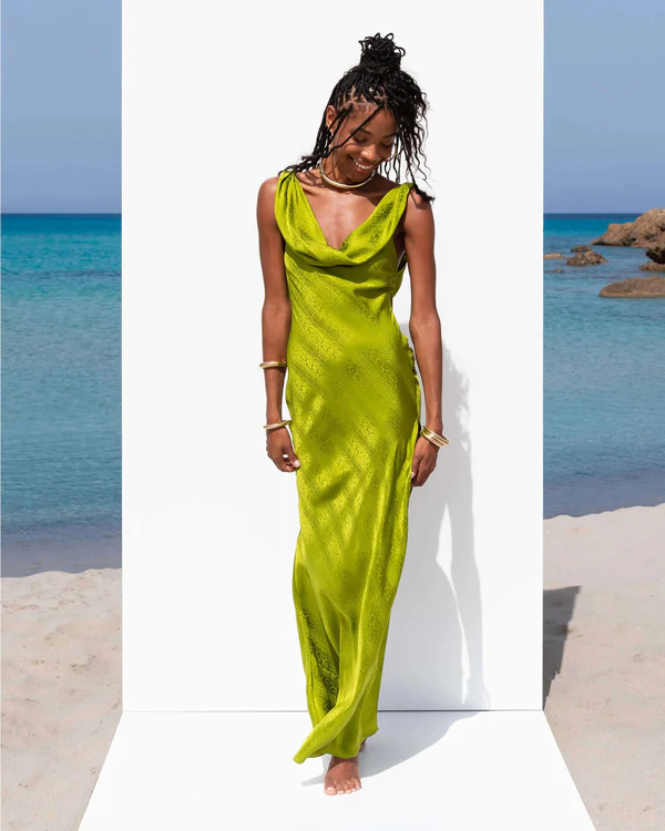 <a href="https://us.ratandboa.com/products/navarra-dress-lime?nosto_source=cmp&amp;amp;ref-placement=427009537">RAT &amp; BOA Navarra Dress</a>, $465