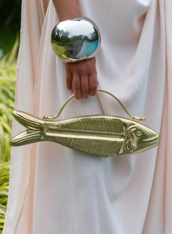 <a href="https://thevin.store/products/fishy#7ec07066841022e9d47e3d8144a24eac">VIN Gold Fishy Clutch</a>, $625
