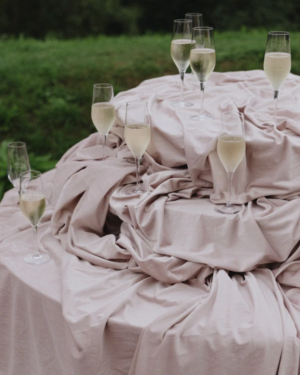 A Whimsical Wedding with a Giant Bow & Curved Tablescape