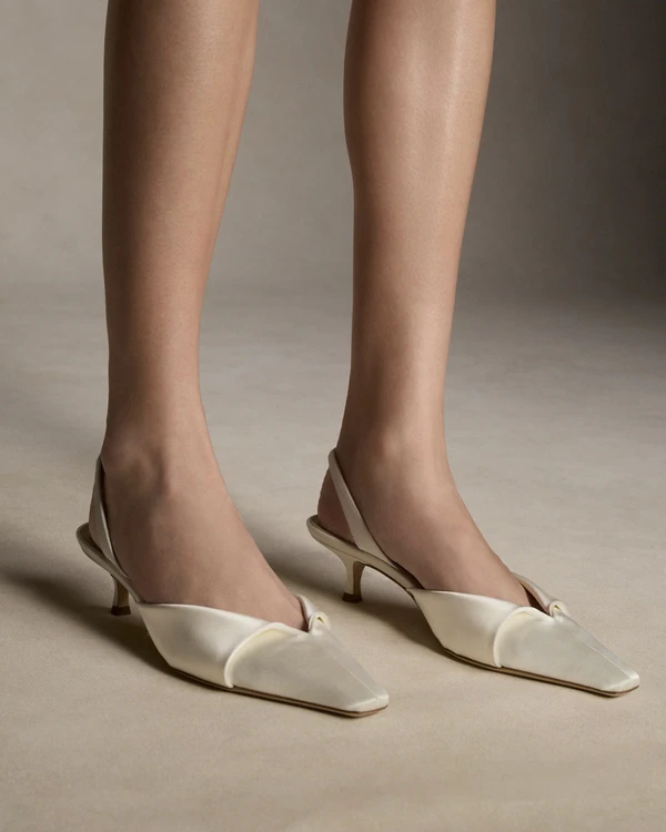 <a href="https://www.daniellefrankelstudio.com/products/alexa">DANIELLE FRANKEL Alexa Slingbacks</a>, $990