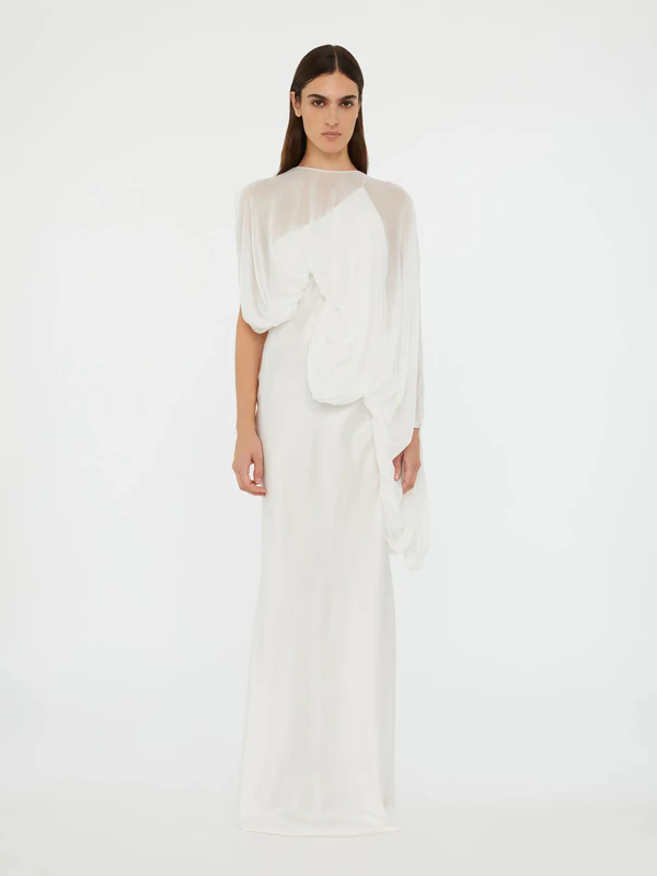 <a href="https://christopheresber.com.au/collections/dresses/products/cumulus-draped-sleeve-dress?_pos=9&_fid=639f58301&_ss=c&variant=45304880726169" target="_blank">CHRISTOPHER ESBER Dress, $1,550</a>