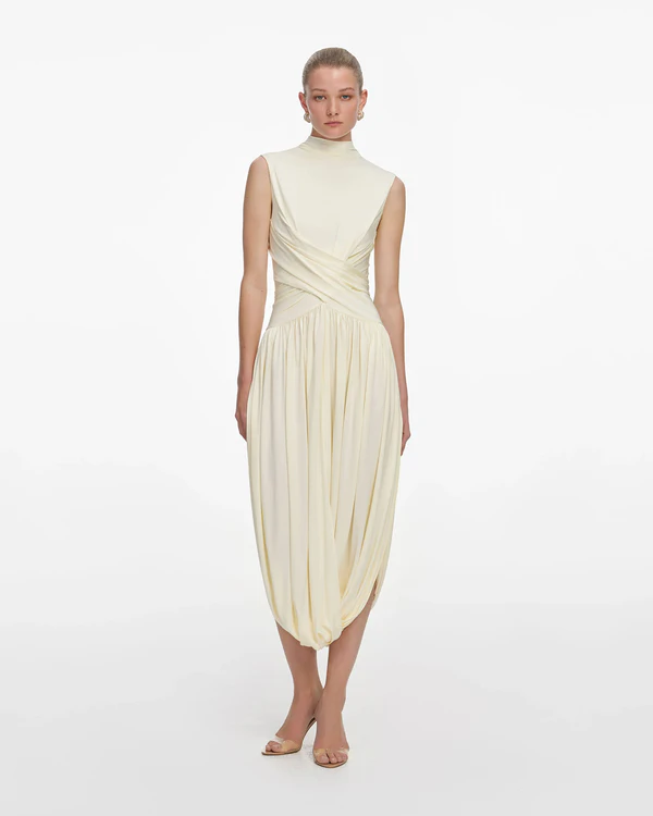 <a href="https://us.self-portrait.com/products/ss26-yellow-jersey-wrap-midi-dress" target="_blank">SELF-PORTRAIT Yellow Jersey Wrap Midi Dress, $620</a>