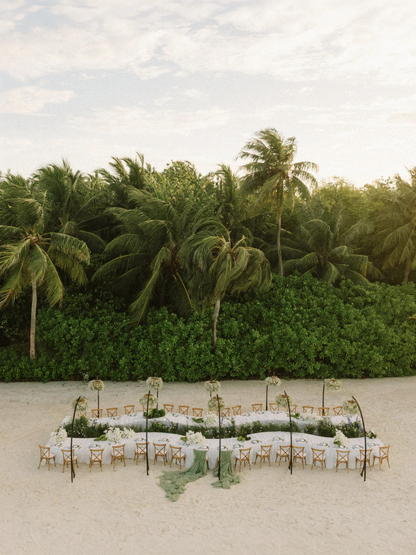 10,000 Lilies & Turquoise Waters Framed This Dreamy Beach Wedding in the Maldives