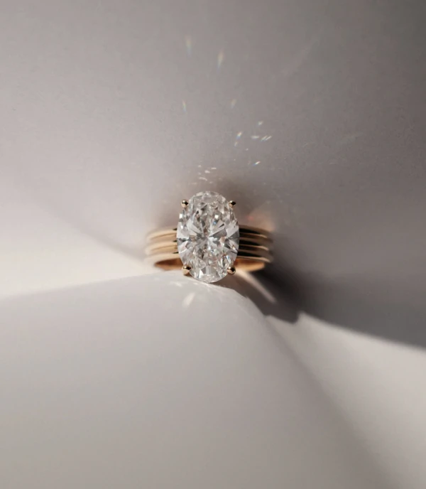 <a href="https://tinxxjewelry.com/collections/engagement/products/oval-cut-diamond-triple-band-solitaire-ring">Tinxx Jewelry</a>
