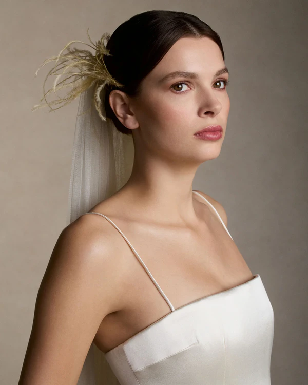 <a href="https://www.daniellefrankelstudio.com/products/feather-veil-with-blusher-chapel/?currency=USD">DANIELLE FRANKEL Veil</a>, $3,990