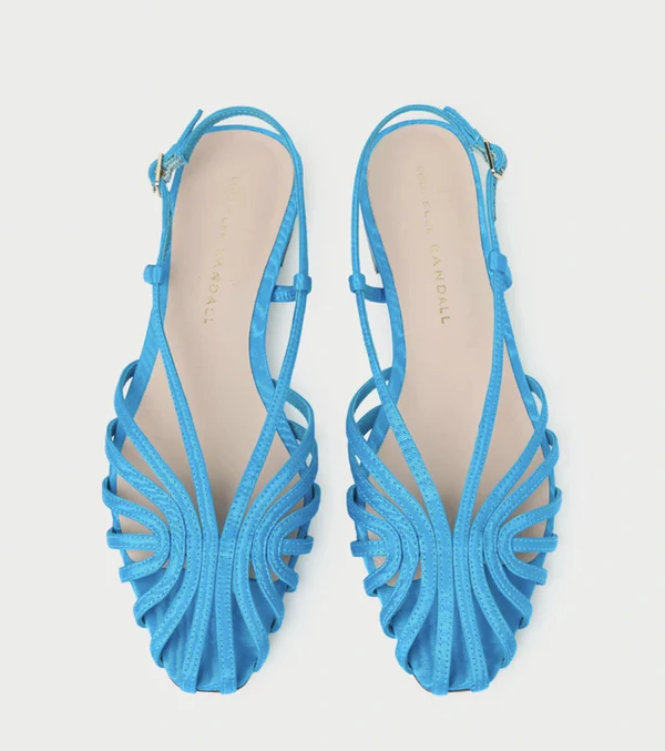 <a href="https://loefflerrandall.com/collections/devon/products/devon-blue-moire-slingback-sandal">LOEFFLER RANDALL Blue Moiré Slingback Sandals, $295</a>