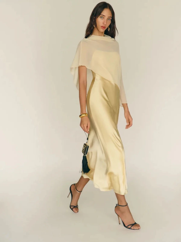 <a href="https://www.thereformation.com/products/lilibeth-silk-dress/1318768DOB.html?dwvar_1318768DOB_color=DOB" target="_blank" rel="noopener noreferrer">REFORMATION Lilibeth Silk Dress</a><span>, $328</span>