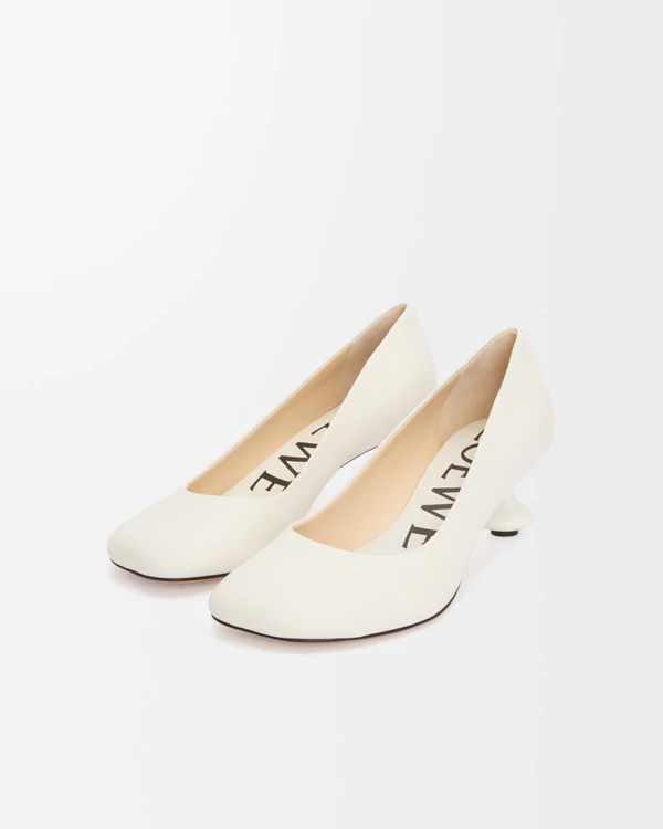 <a href="https://www.loewe.com/usa/en/women/shoes/pumps/toy-pump-in-goatskin/L815S01X78-2100.html">LOEWE Toy Pump</a>, $900