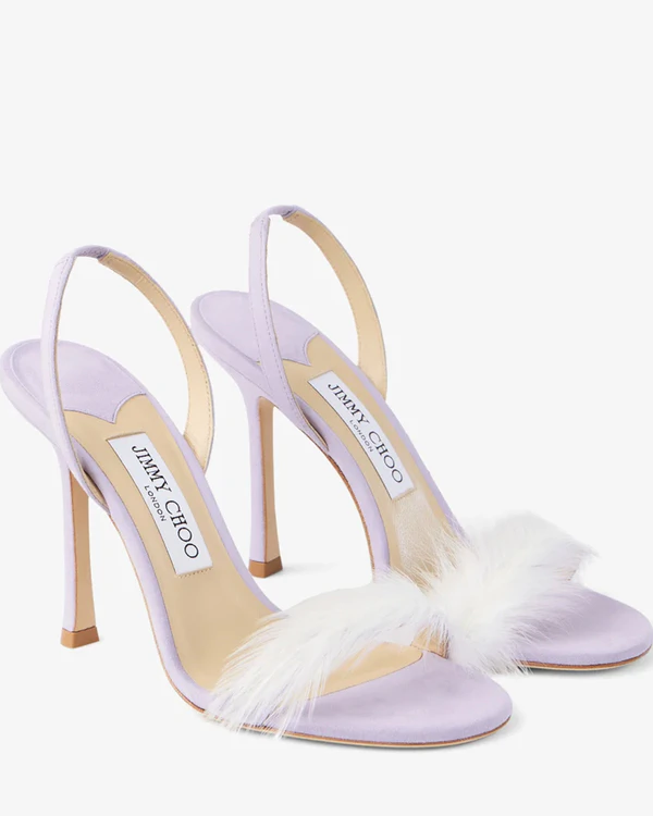 <a href="https://us.jimmychoo.com/en/women/shoes/“72138”/lilac-suede-sandal-with-feather-embellishment--199872138NZQ051843.html#page=2&start=1">JIMMY CHOO 72138 Lilac Suede Sandal</a>, $1,050