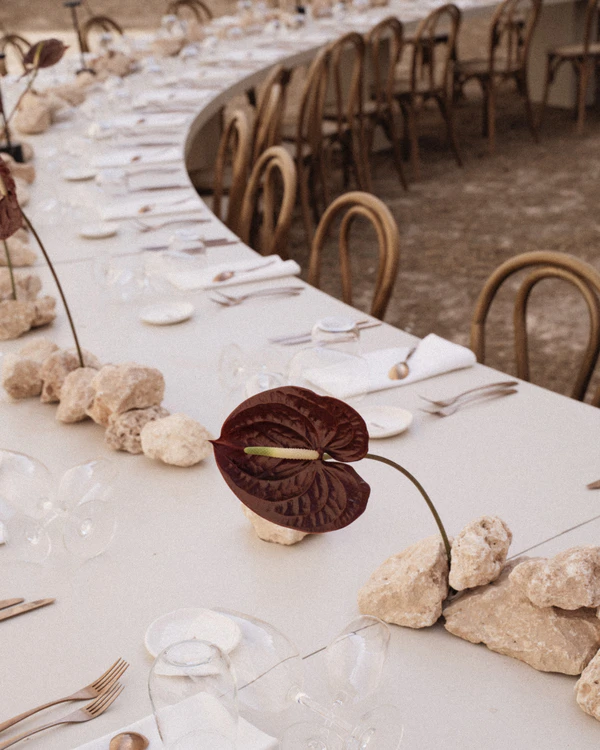 An Intimate Menorca Quarry Wedding with Avant-Garde Design & Vintage Bridal Looks