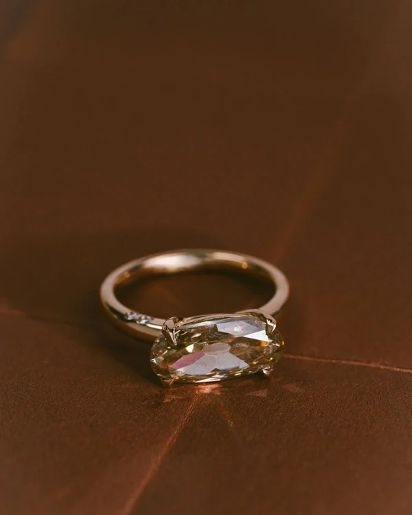 <a href="https://junerings.com/products/antique-cut-cushion-cigar-band-solitaire-oak?variant=43549256941616&_pos=8&_sid=bdc216fd0&_ss=r">June Rings</a>