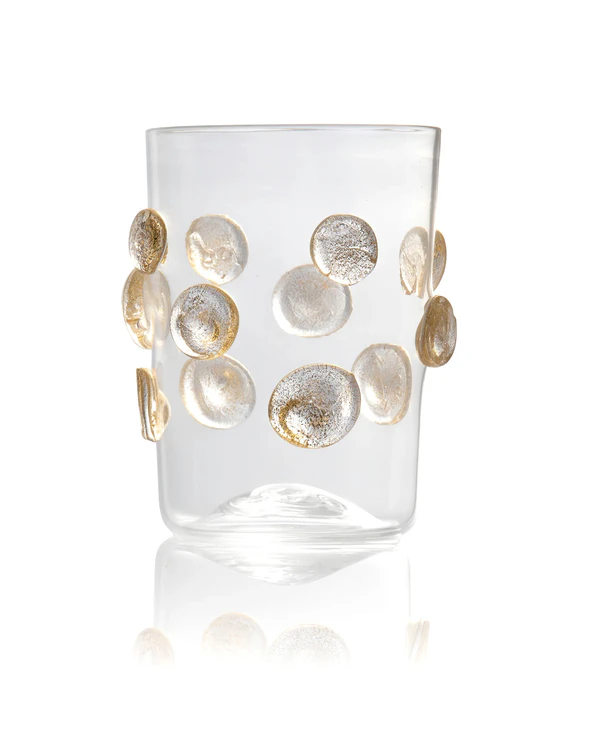 <a href="https://www.fete.com/products/athena-gold-application-cups?variant=42838555427025&gad_source=1&gad_campaignid=23965047082&gbraid=0AAAABCH6A_sIeUvCHsaz293SZCmhZdv29&gclid=CjwKCAjw6rfSBhAqEiwA_yocpjc3rzoAi0kMAPEGSYG52GUQyzDX6nyKR98kiWgvZH30sCg4fzGISRoCVDgQAvD_BwE">PAMPLEMOUSSE Athena Handmade Gold Applications Murano Tumbler Glass</a> from Fête, $185