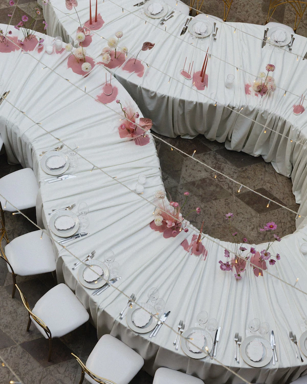 A Whimsical Wedding with a Giant Bow & Curved Tablescape