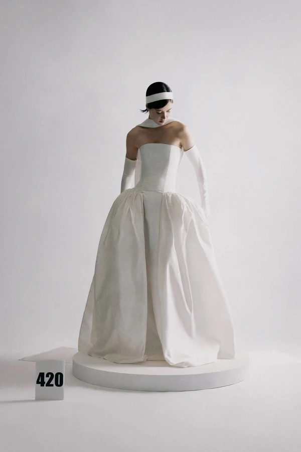 <a href="https://www.blanc-wear.com/gowns/la-vingtieme">BLANC WEAR Dress,</a> $6,790