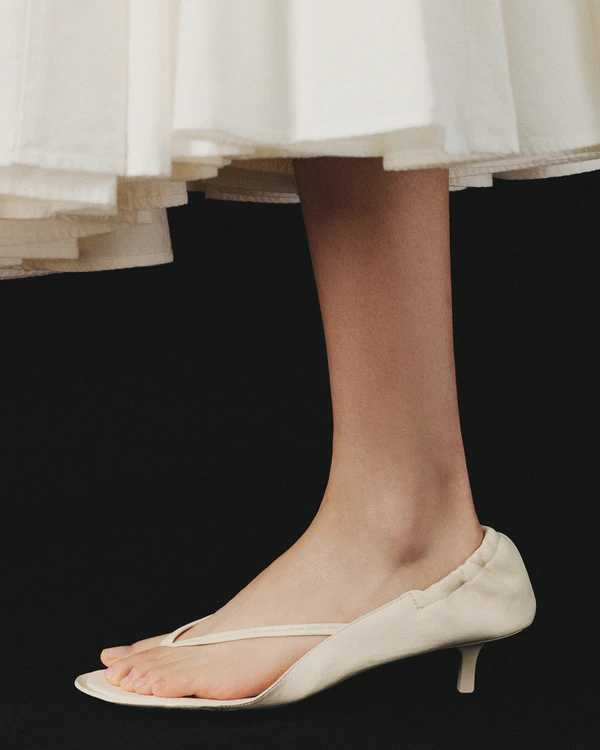 <a href="https://www.jacquemus.com/en_us/the-low-sandals/FOW00204AC27L26115.html">JACQUEMUS The Low Sandals</a>, $870