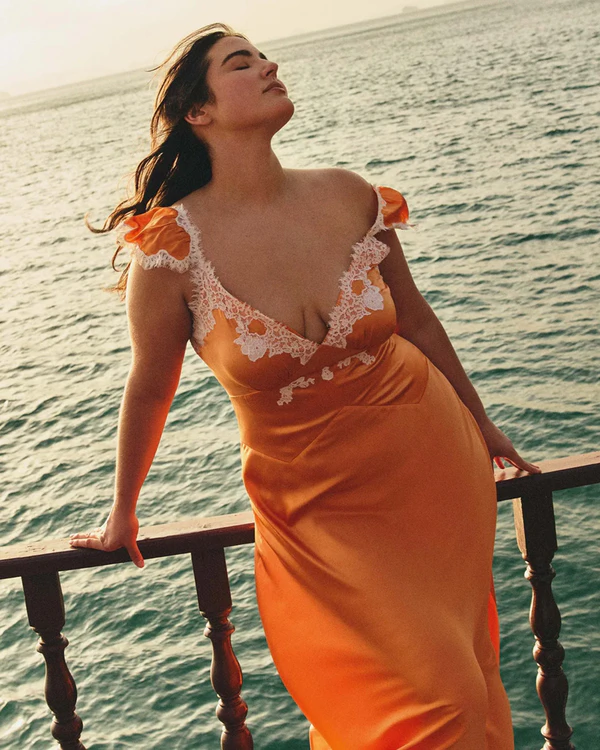 <a href="https://www.shopdoen.com/products/fiona-dress-tangerine">Dôen</a>
