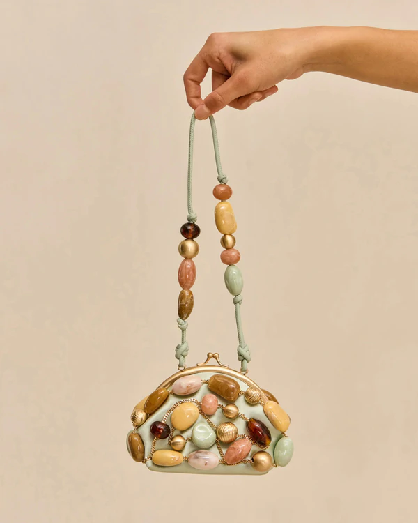 <a href="https://cultgaia.com/products/mercier-mini-wrislet-cool-mint-bauble-multi">CULT GAIA Mini Wrislet</a>, $498