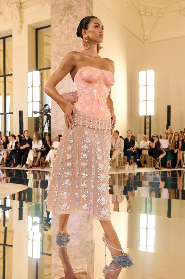 <a href="https://schiaparelli.com/en/pages/haute-couture-automne-hiver-2026-27">Schiaparelli</a>