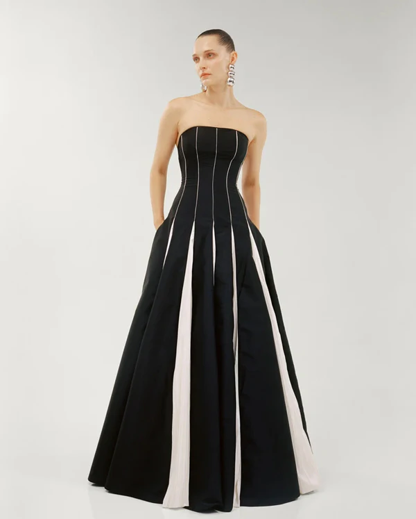 <a href="https://marmar-halim.com/collections/resort/products/strapless-a-line-taffeta-dress-with-piping-pleated-detail">MARAMAR HALIM Dress</a>, $3336