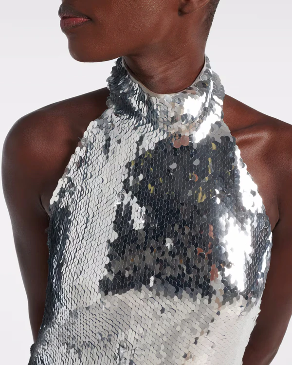 <a href="https://www.mytheresa.com/us/en/women/balmain-sequined-minidress-silver-p01070117">BALMAIN Dress</a> from Mytheresa, $2450