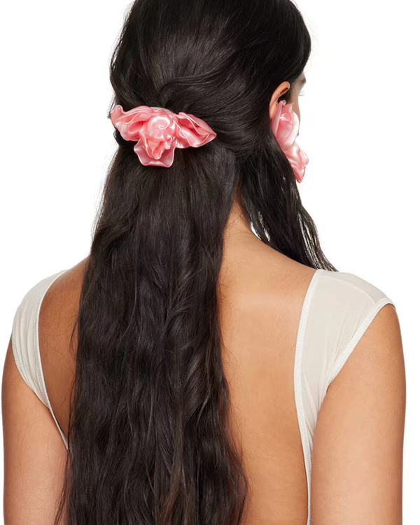 <a href="https://www.ssense.com/en-us/women/product/florence-tetier/ssense-exclusive-pink-rose-hair-pin/15305691">TETIER BIJOUX Pink Rose Hair Pin</a> from Ssense, $660