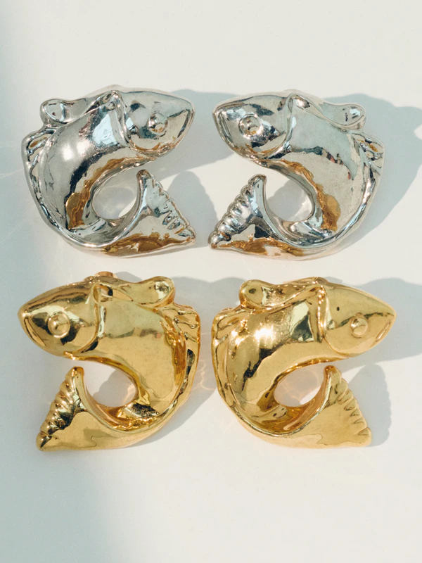 <a href="https://www.jacquemus.com/en_us/the-poisson-earrings/JWW00801AOT4063980.html">JACQUEMUS The Poisson Earrings</a>, $520