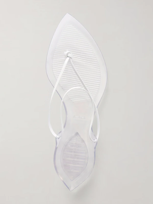 <a href="https://www.net-a-porter.com/en-us/shop/product/alaia/shoes/flat/invisible-jelly-sandals/46376663163088575">ALAIA Invisible Jelly Sandals from Net-a-Porter</a>, $850