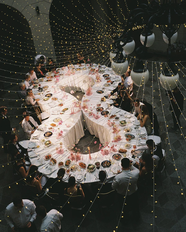 A Whimsical Wedding with a Giant Bow & Curved Tablescape