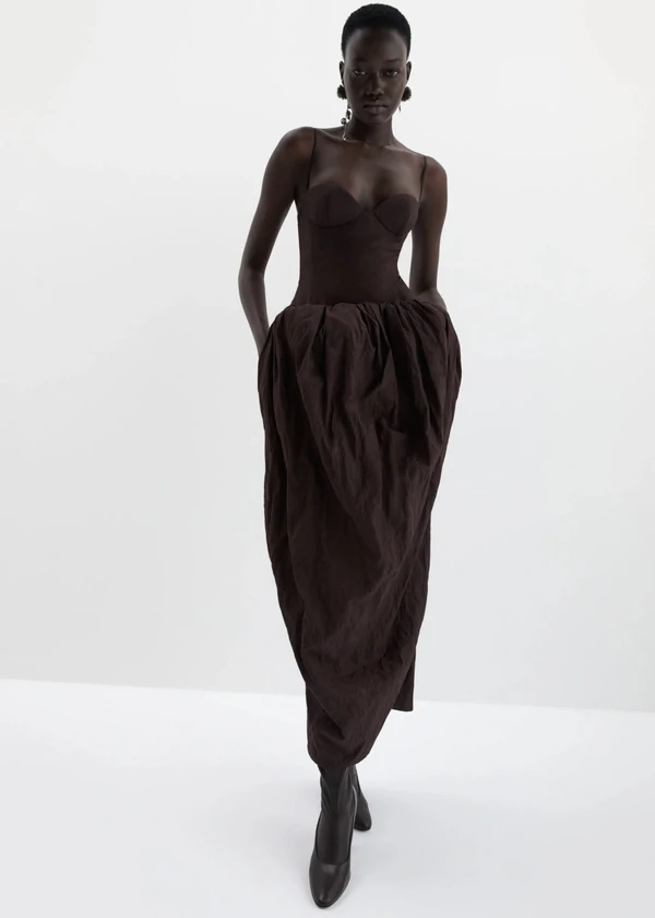 <a href="https://www.magdabutrym.com/us-en/product/pf26-dress-25-brown">MAGDA BUTRYM Bustier Dress with Voluminous Skirt</a>, $2,250