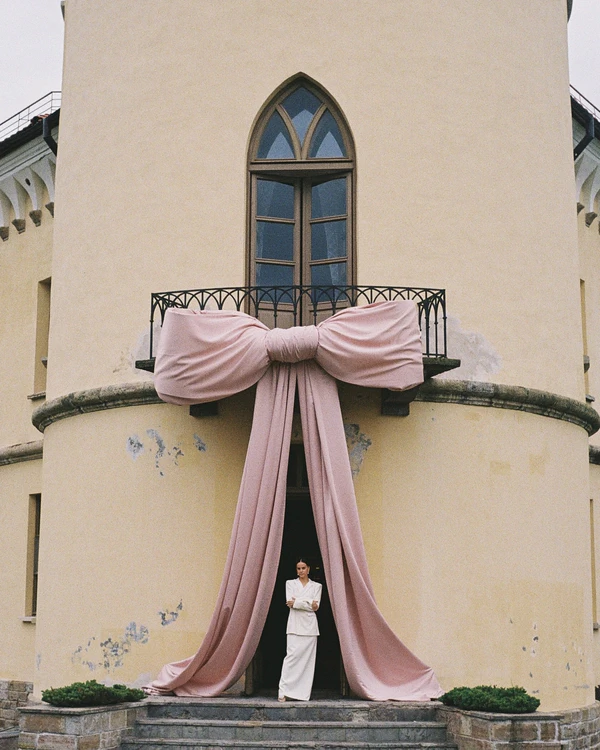 A Whimsical Wedding with a Giant Bow & Curved Tablescape