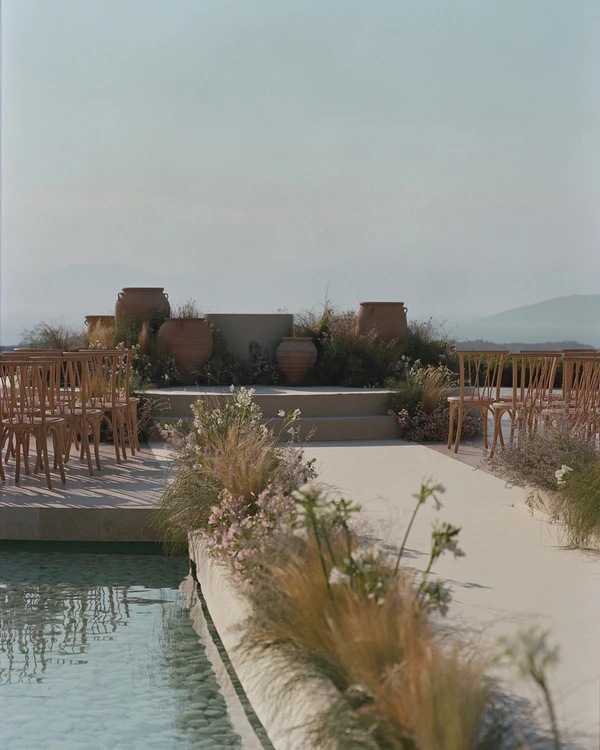 A Cinematic & Artistic Color-Washed Wedding Weekend at Amanzoe in Greece
