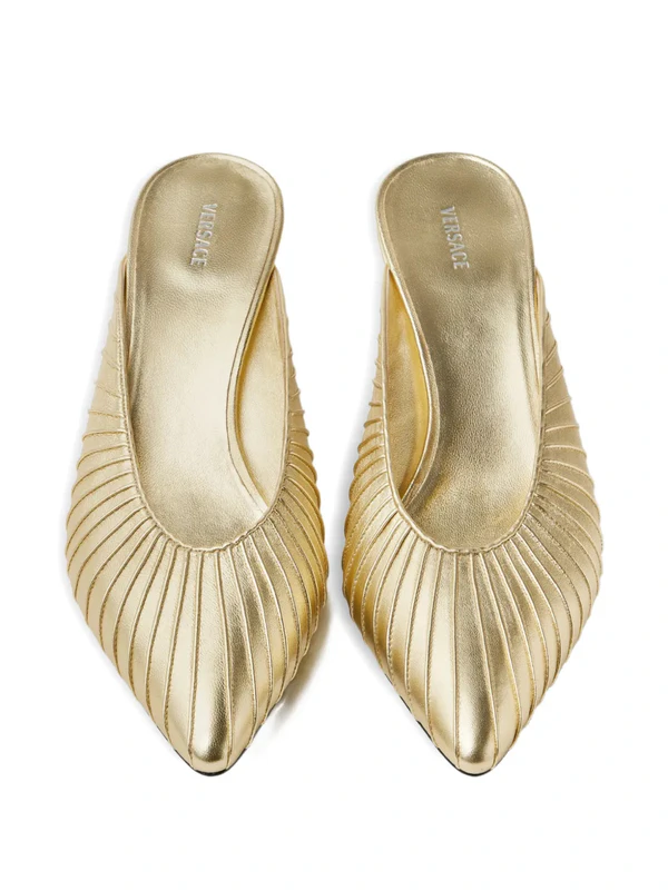 <a href="https://www.farfetch.com/shopping/women/versace-gianni-metallic-nappa-mules-55-mm-item-36281350.aspx">VERSACE Mules</a> from Farfetch, $1175