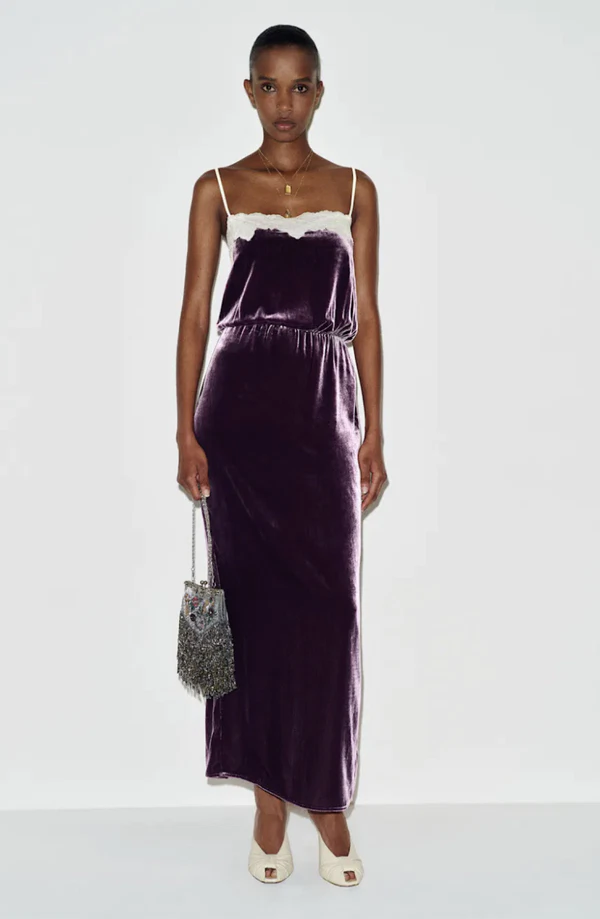 <a href="https://www.thereformation.com/products/kalinka-velvet-dress/1320721CUV.html?dwvar_1320721CUV_color=CUV">REFORMATION Velvet Maxi Dress, $348</a>