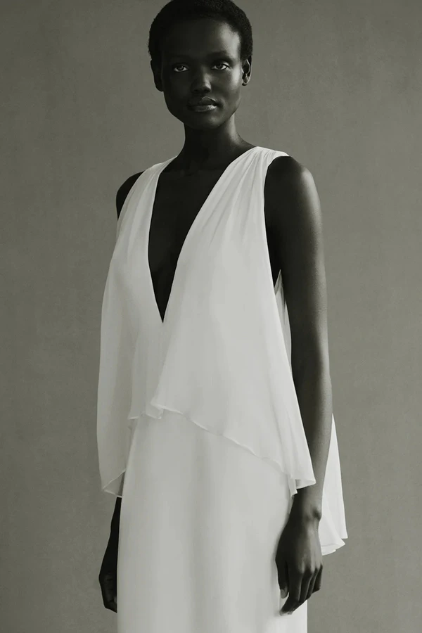 <a href="https://tove-studio.com/products/galina-dress-white">TOVE Dress</a>, $1510