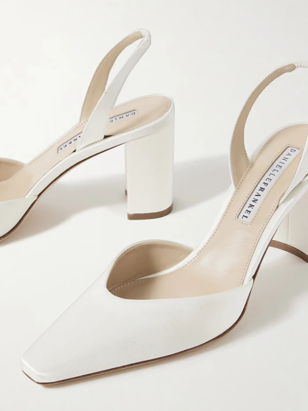 <a href="https://www.net-a-porter.com/en-us/shop/product/danielle-frankel/shoes/mid-heel/juno-satin-slingback-pumps/46376663162935210?utm_source=google&amp;utm_medium=cpc&amp;utm_campaign=GOO%3ANAP%3AAM%3AUS%3ANY%3AENG%3ASEAU%3APMX%3AMAN%3AMXO%3ANEW%3AWN%3AUPLOADS%3ALV0%3ALV1%3ALV2%3AXXX%3A0%3AUPLOADS%3A&amp;utm_id=23578983964&amp;utm_term=3074457345630108739&amp;vtp00=GOOGLE&amp;vtp01=SEAU&amp;vtp02=&amp;vtp03=&amp;vtp04=x&amp;vtp05=c&amp;vtp06=&amp;vtp07=pla&amp;gad_source=1&amp;gad_campaignid=23574366872&amp;gbraid=0AAAAADRhZntBiGgiLxF_2UsoqlVY9AtHG&amp;gclid=CjwKCAjw_KjVBhAHEiwAnC0N9L02XbBJqLAta4o-UNEN9_MIKs7T0ExYGWcNlkBHQRy1d4AiDHAt4RoC2AUQAvD_BwE">DANIELLE FRANKEL Satin Slingback Pumps from Net-a-Porter, $890</a>
