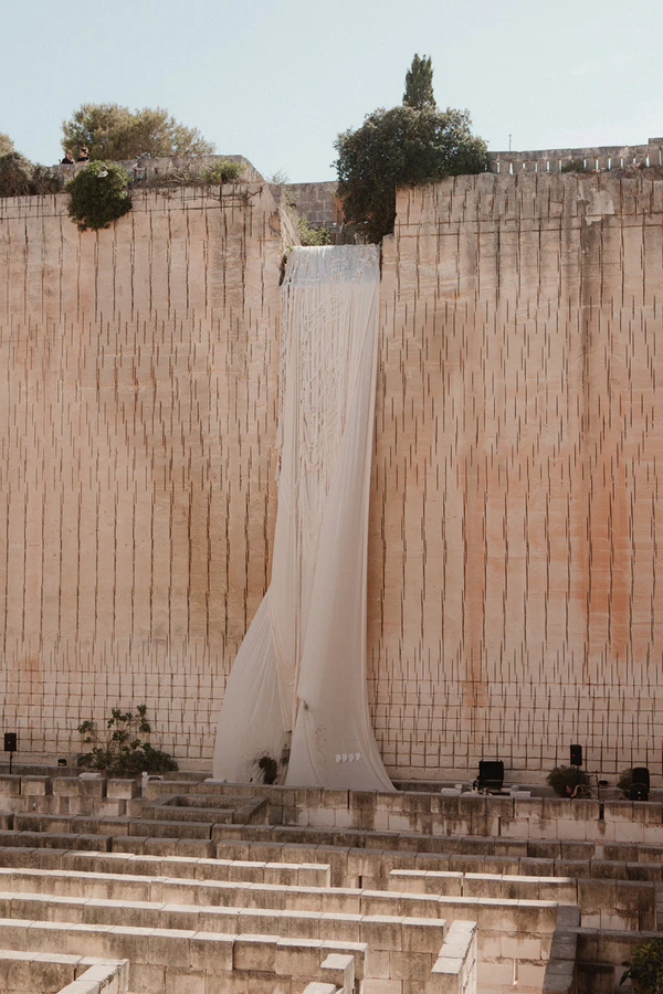 Giant Sculptural Florals & Dreamy Drapery by Mia Sylvia at This Stone Quarry Wedding in Menorca