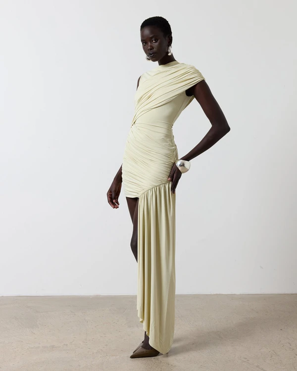 <a href="https://www.delavali.com/products/ravenna-spandex-jersey-ivory" target="_blank">DE LA VALI Ravenna Mini Dress, $575</a>